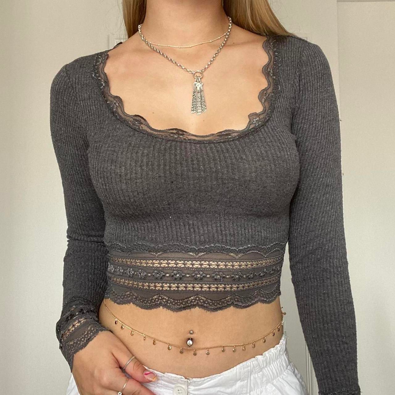 Crop top de encaje con costuras de tela acanalada manga larga