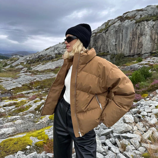 Parka de plumón blanco con cuello levantado y cremallera de otoño e invierno