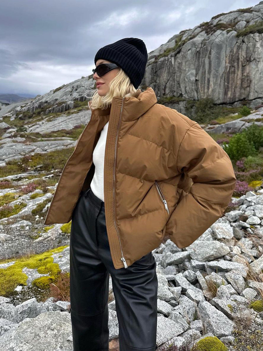 Parka de plumón blanco con cuello levantado y cremallera de otoño e invierno